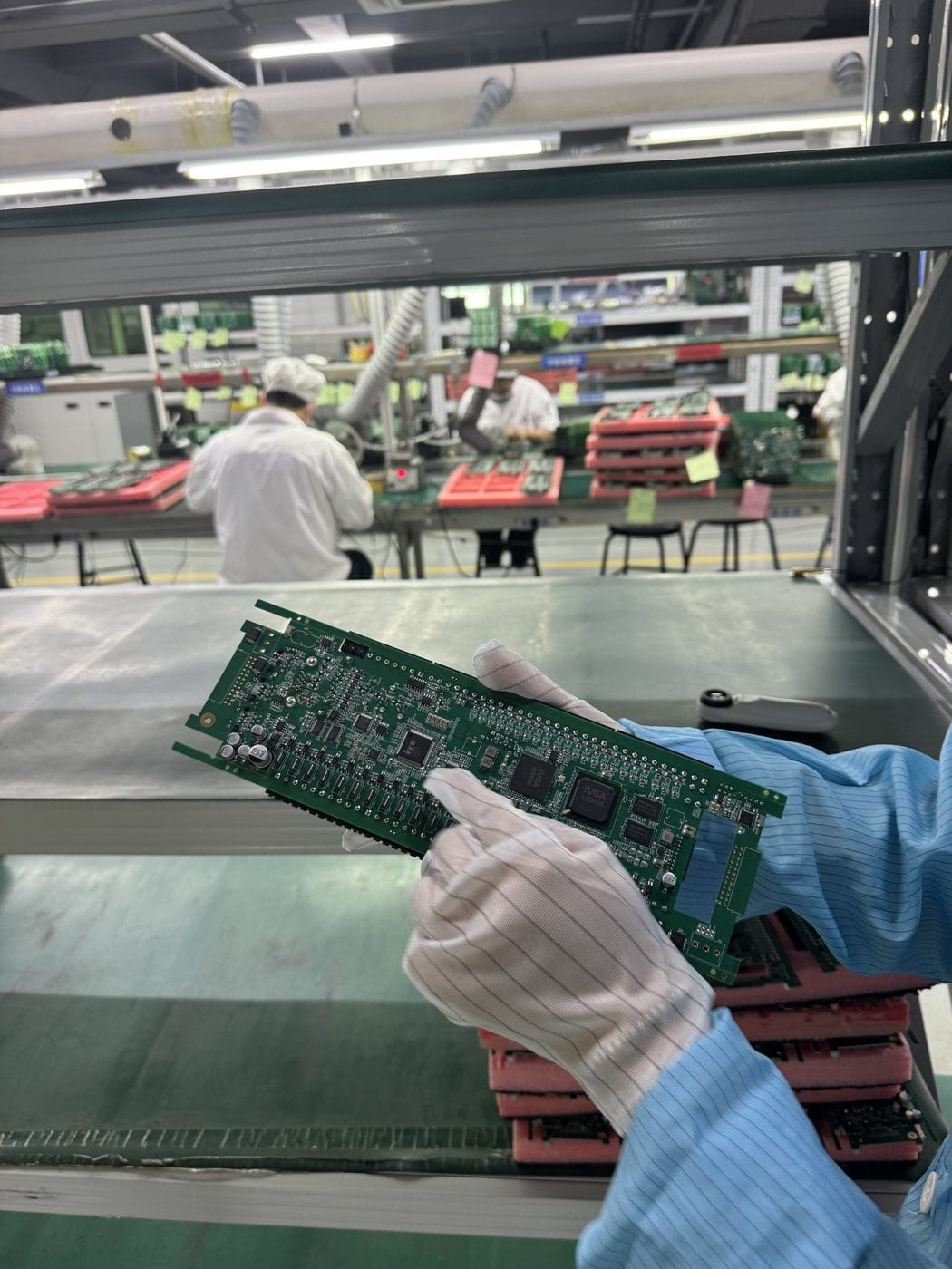 A finished, fully assembled PCBA board fresh off the production line